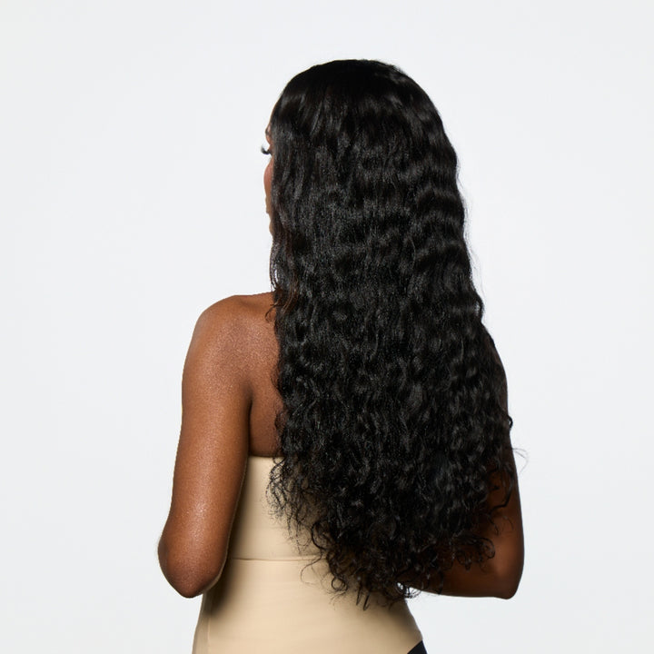 Model is wearing Raw Cambodian Wavy Elegance U-Part Wig from YUMMY Extensions